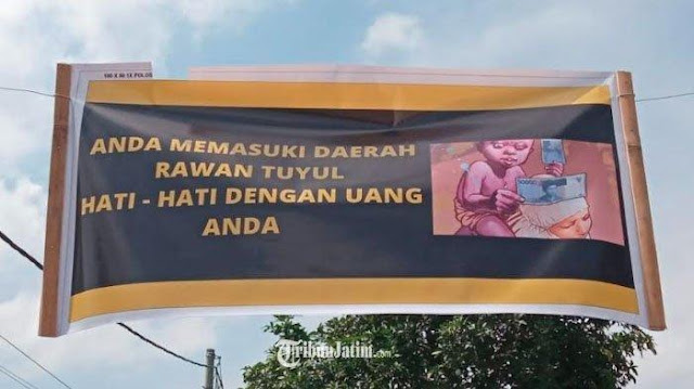 Viral Spanduk 'Anda Memasuki Daerah Rawan Tuyul' di Jember, Camat Beri Penjelasan