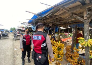 Tim URC Samapta Polres Lhokseumawe tingkatkan patroli dialogis di kawasan pasar tradisional, Kota Lhokseumawe. FOTO/Net