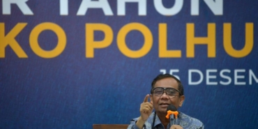 Menko Polhukam Mahfud MD menyampaikan catatan akhir tahun di Gedung Kemenko Polhukam, Jakarta, Kamis (15/12/2022).