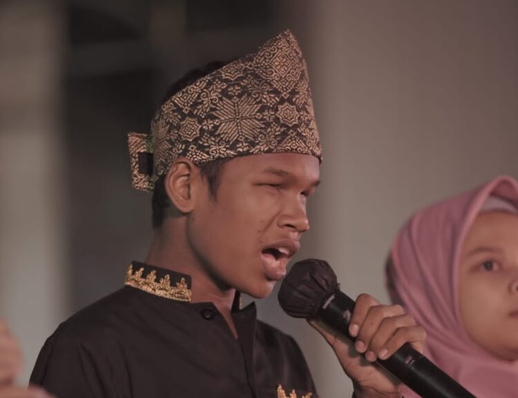 Imam dari SLBN Pembina Aceh Tamiang memperoleh medali emas pada cabang lomba menyanyi siswa difabel. FOTO/Dok. Humas Disdik Aceh. Ⓒ Hak Cipta Foto di atas dikembalikan sesungguhnya kepada Pemilik Foto