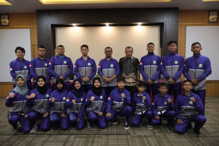 Alhudri dalam sambutan yang dibacakan oleh Manajer Tim Karateka Dinas Pendidikan Aceh dan Kepala Bidang Sarana dan Prasarana, Sya'baniar, Kamis, 14 September 2023. FOTO/Dok. DIsdik Aceh. Ⓒ Hak Cipta Foto di atas dikembalikan sesungguhnya kepada Pemilik Foto