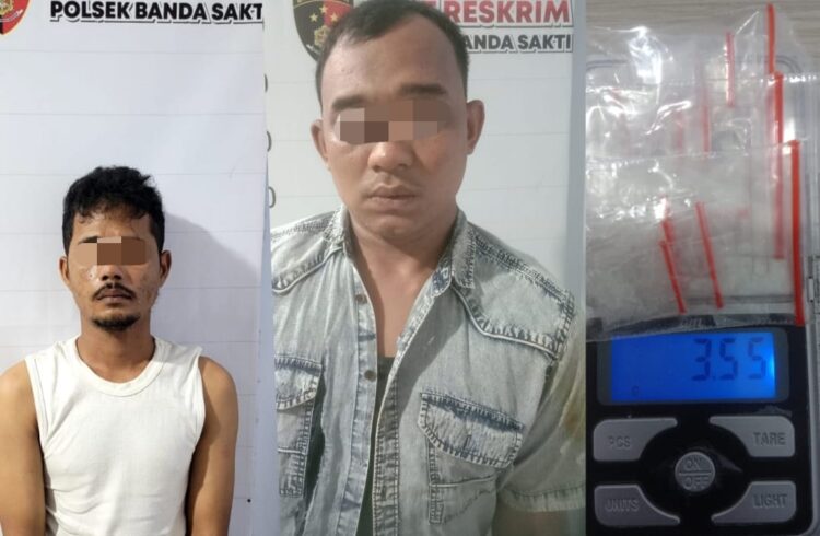 Polsek Banda Sakti ciduk dua tersangka pengedar narkotika IS (31) dan RT (29) warga kota lhokseumawe serta mengamankan barang bukti sabu–sabu, Sabtu (21/10/2023). FOTO/Dok. Polsek Banda Sakti. Ⓒ Hak cipta foto di atas dikembalikan sesungguhnya kepada pemilik foto