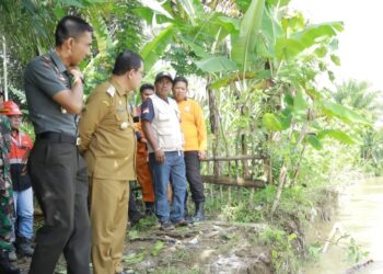 Pejabat Pj Bupati Aceh Barat Mahdi Efendi serta anggota Forkopimda, berlangsung di lapangan Pasie Leuhan Kecamatan Johan Pahlawan, Senin ( 13/11/23). FOTO/HAI/Wan. Ⓒ Hak cipta foto di atas dikembalikan sesungguhnya kepada pemilik foto